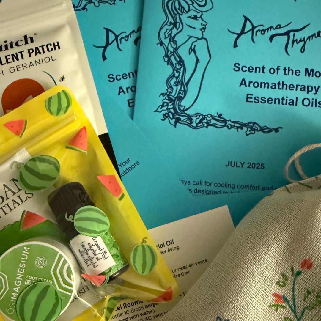 Aromatherapy products including a bottle of essential oil, on the go aromatherapy packets, and a magazine with 'Aroma Thyme' branding.