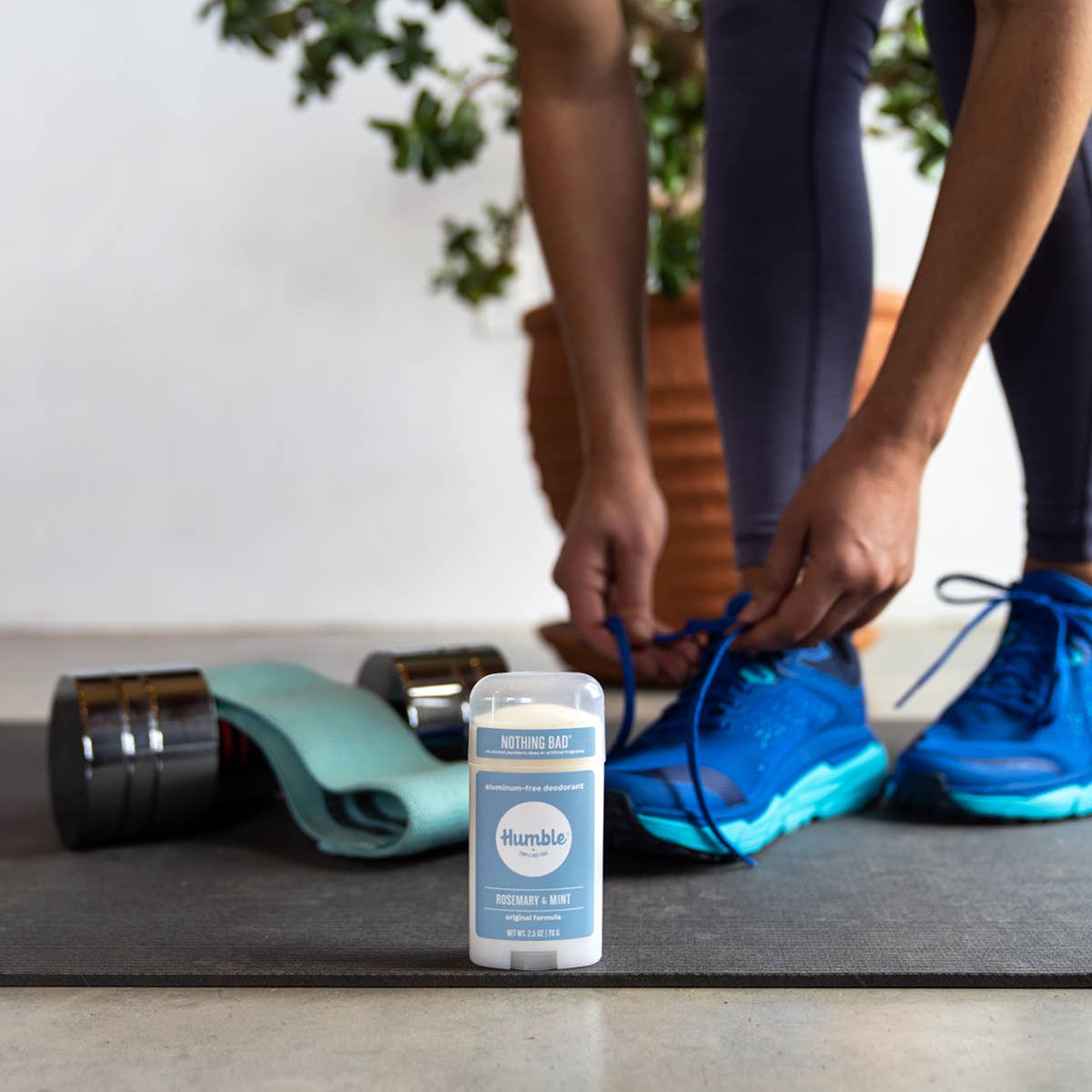 Woman in a gym with Humble original formula deodorant – Rosemary & Mint scent, aluminum free www.aromathyme.com