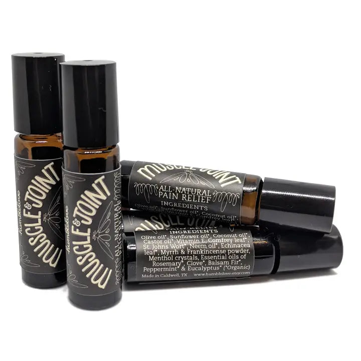 Three bottles of Muscle & Joint pain relief roll on therapy with black and white labels on a white background.