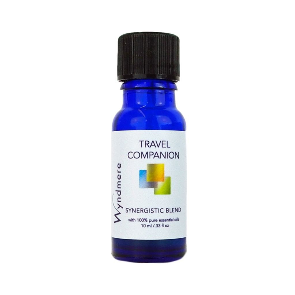Blue bottle labeled 'Travel Companion' with a white label on a white background