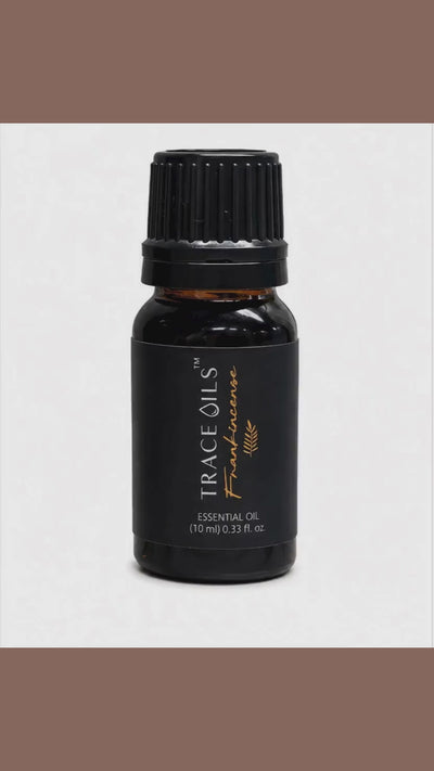 Frankincense Boswellia Neglecta  pure essential oil bottle pouring the oil